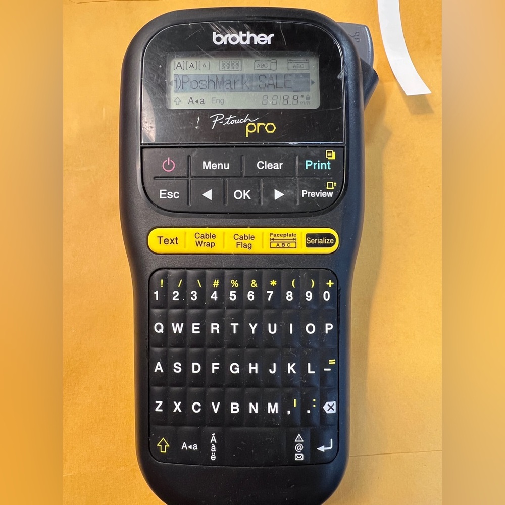 Brother P-touch Pro Label Maker in Black and Yellow, White Label tape included